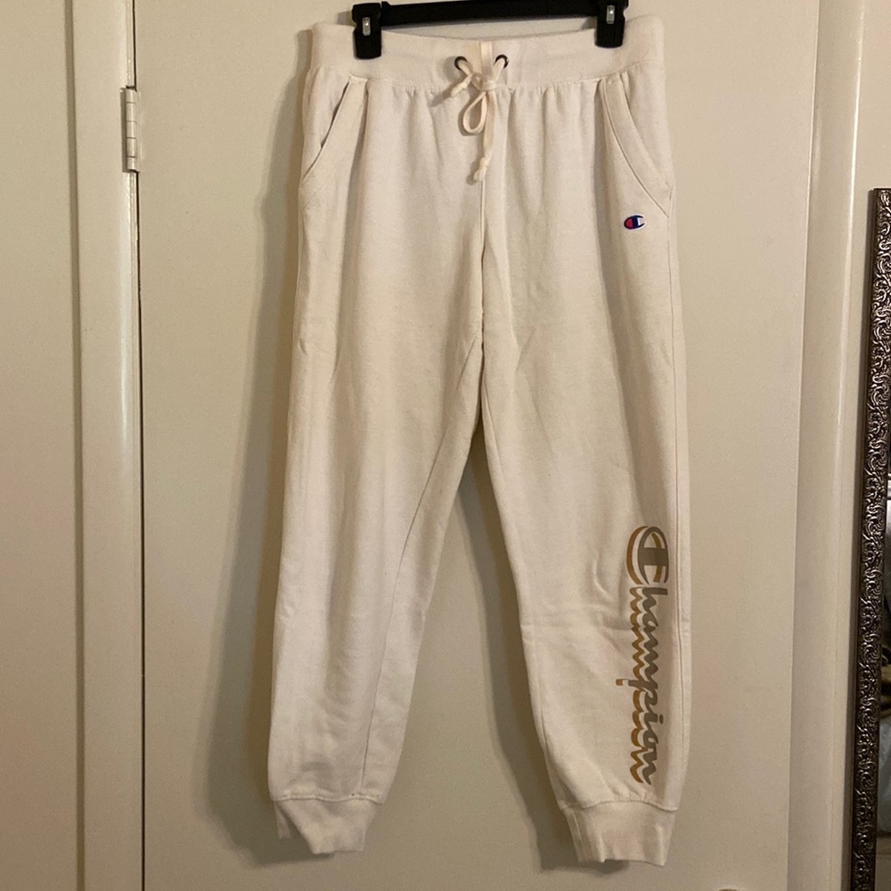 Cream colored Champion sweatpants, size medium,